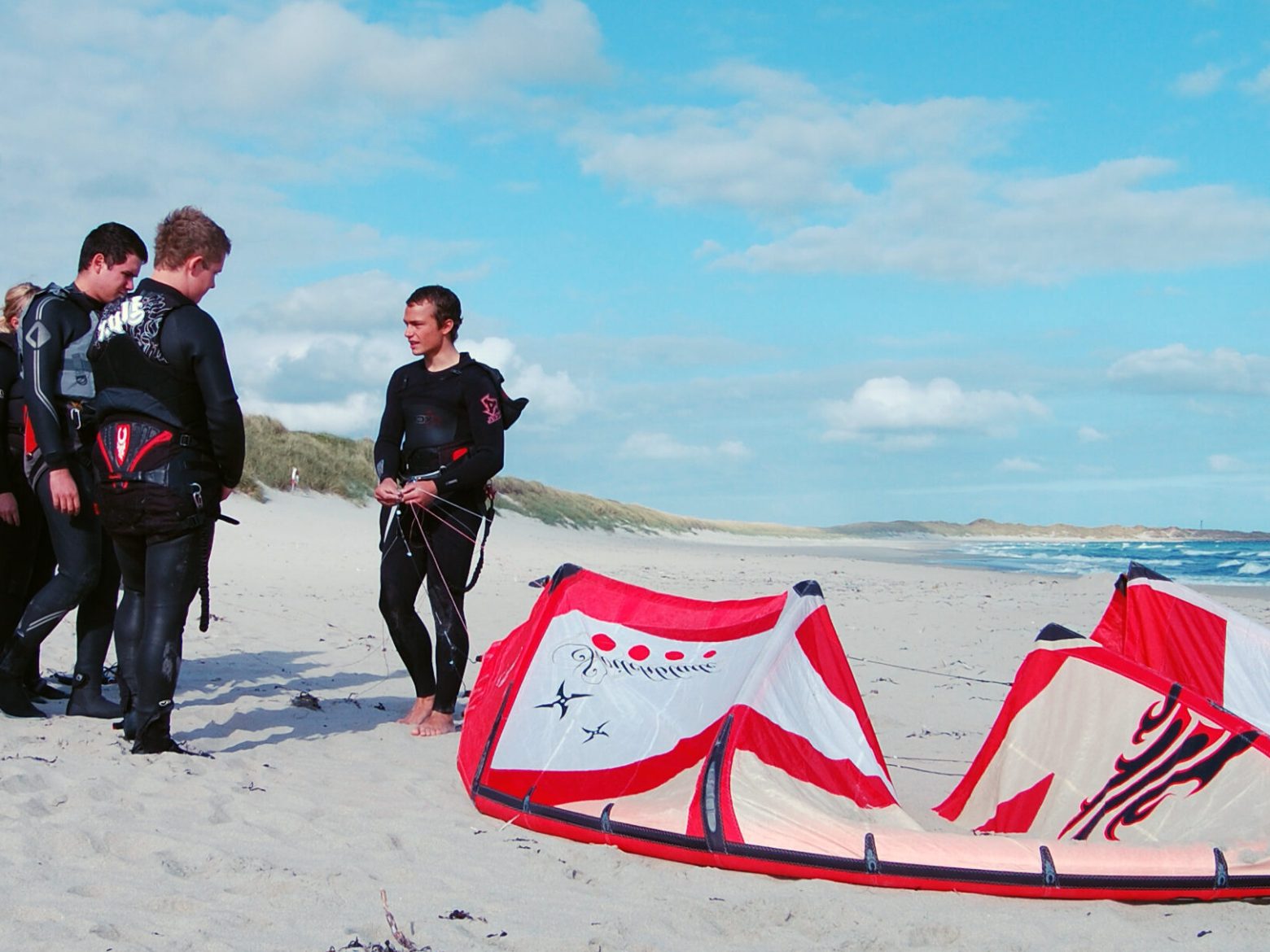 a group of people on a beach