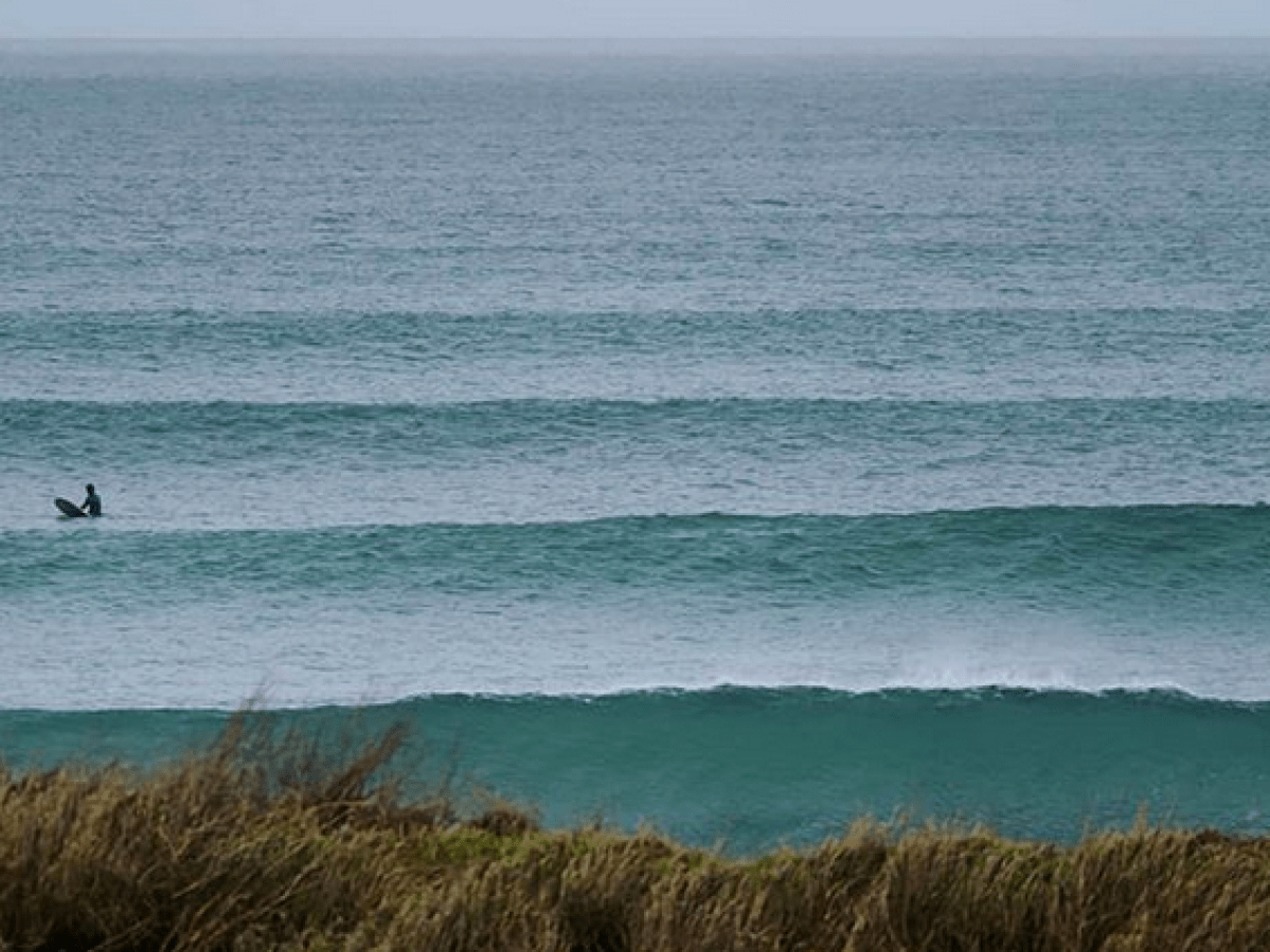 a body of water next to the ocean