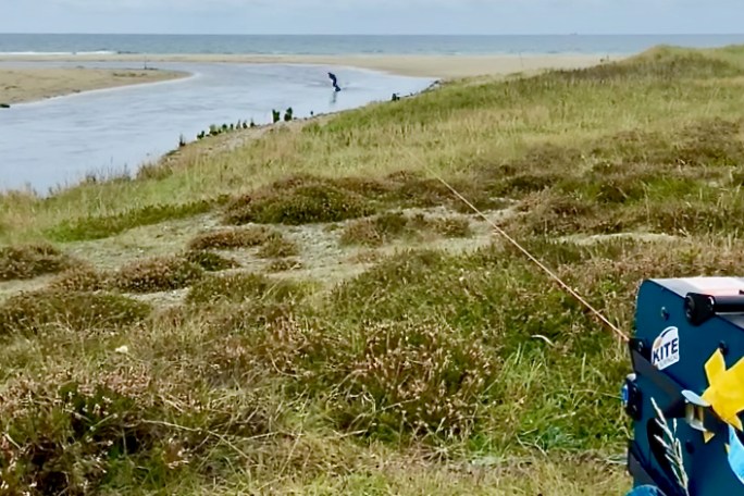 a man riding a wakeboard in a river