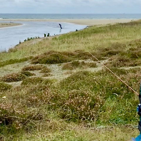a man riding a wakeboard in a river