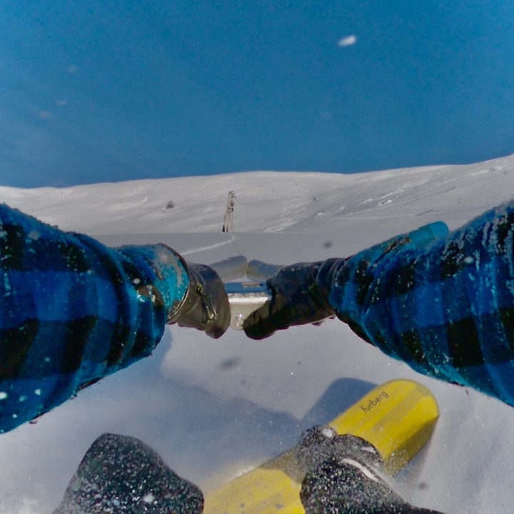 a man riding a snowboard